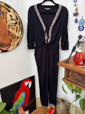 BCBG Size XS Black Jumpsuit w/pockets. Lightweight and very comfortable!